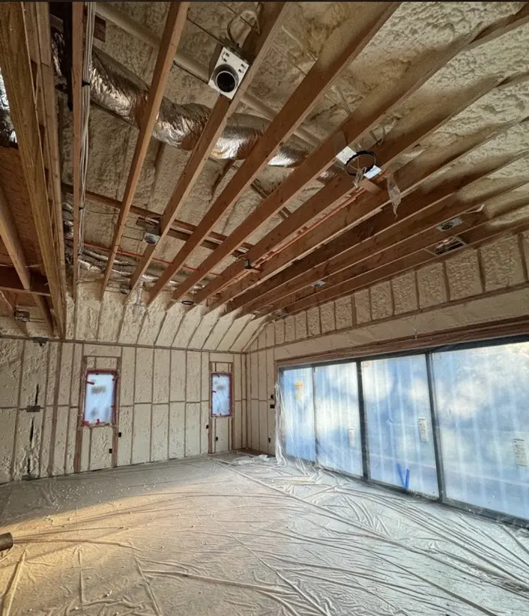Interior walls and ceiling insulated with spray foam during new construction in Union Hill-Novelty Hill